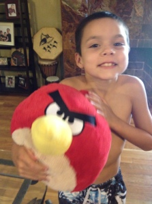 So excited about his Angry Bird!
